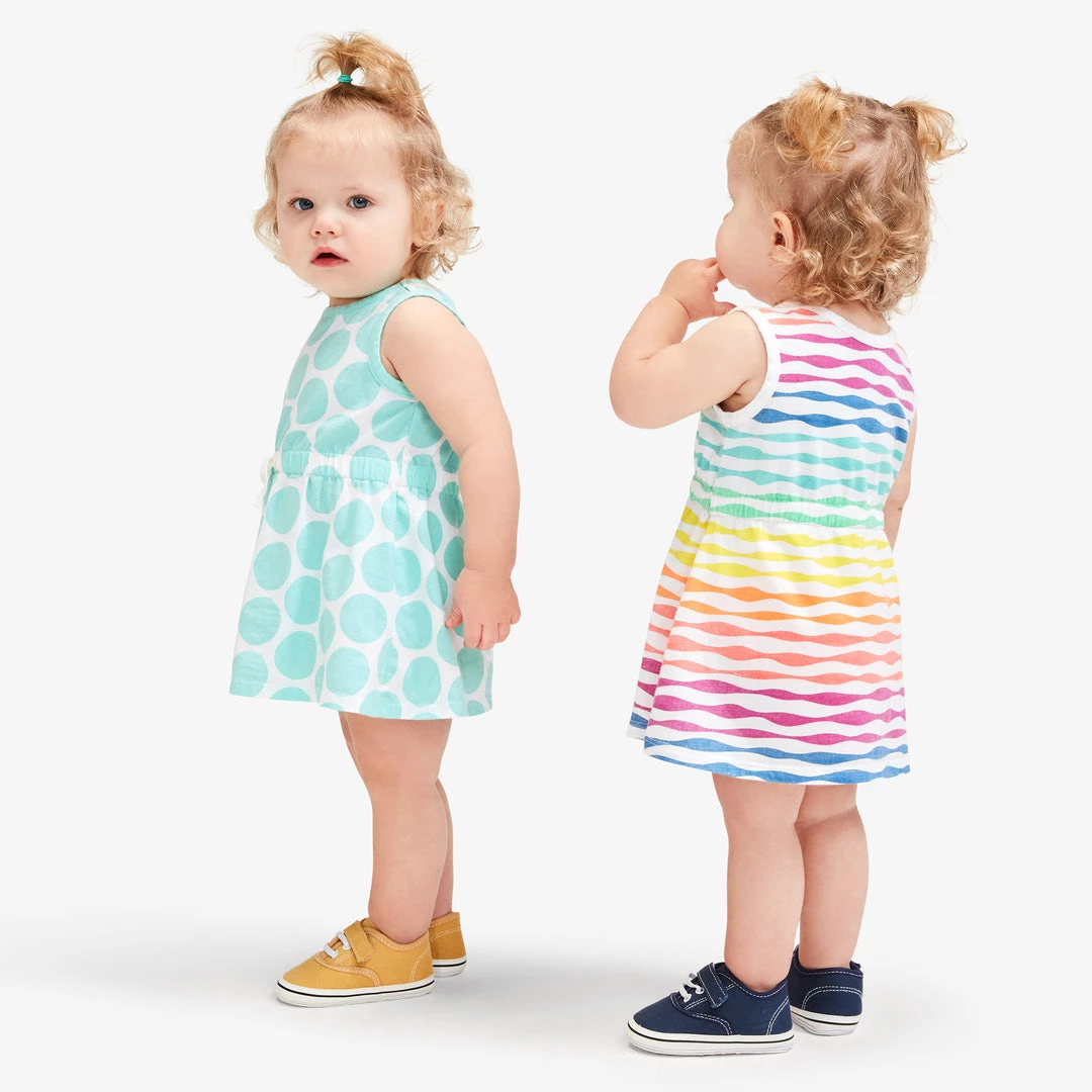 Primary.com $10 And Under Baby Drawstring Dress In Cutout Dot 7 Primary.com $10 And Under Baby Drawstring Dress In Cutout Dot